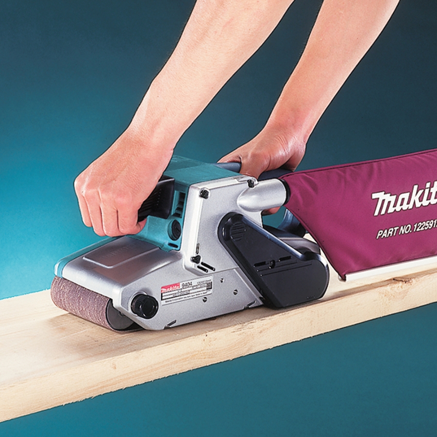Makita 9404J Bandschleifer 1.010 W • 210-440 m/min • 100 mm